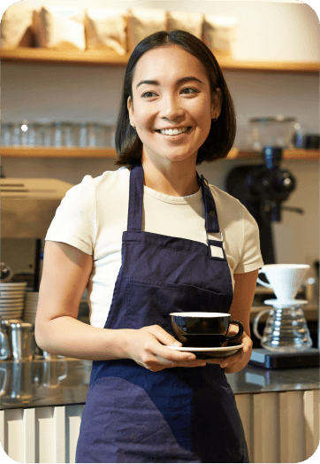 Barista sorrindo